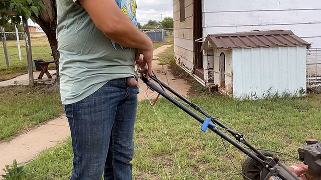 Taking a very desperate and relieving public piss while mowing the yard
