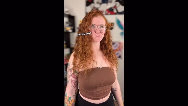Busty Redhead Craves Nerds!