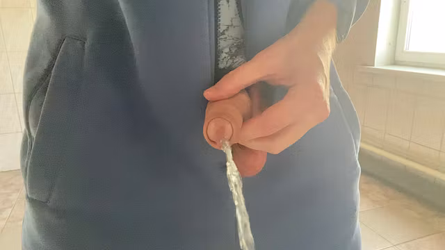 Pissing in a winter jumpsuit POV