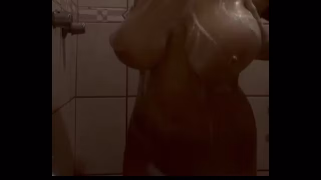 Blonde slut with giant tits gets wet when she touches herself
