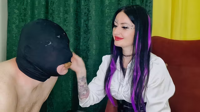Spitting and slapping from strict Dominatrix Nika. Face slaps and spitting.
