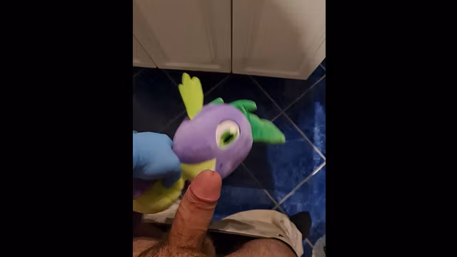 Playing wirh my spike the dragon plush