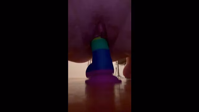Blonde bitch squirts on rainbow dildo!