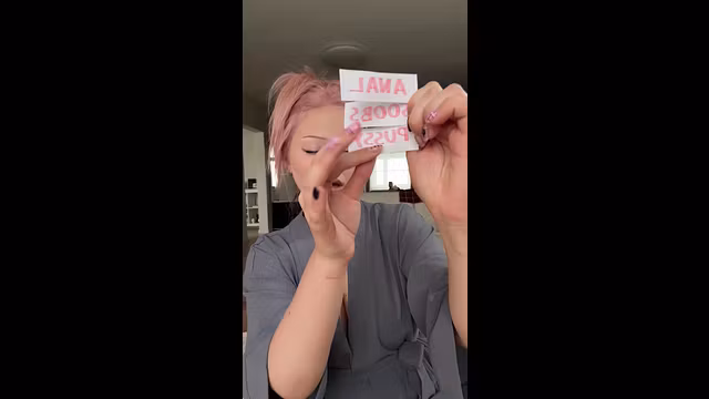 Big tits bounce as she teases with cards 🥵