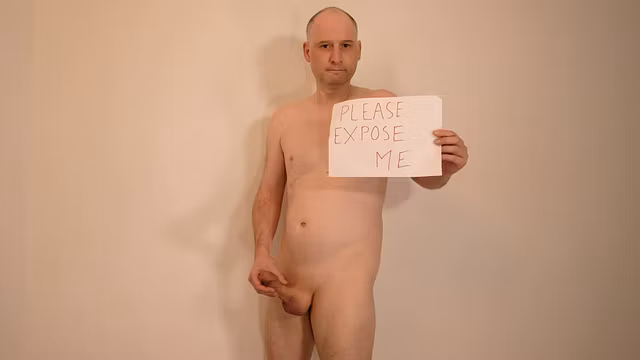 Male naked gives name holds please expose me sign, he masturbates his shaved uncut erect cock horny to be exposed
