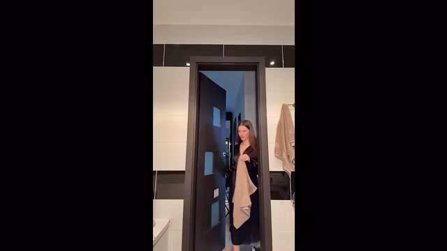 She peeks through the door, legs already wet 💕