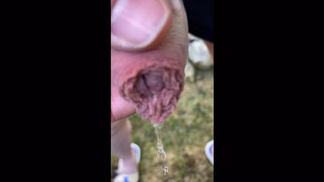 Walking in the park public piss with fat foreskin.